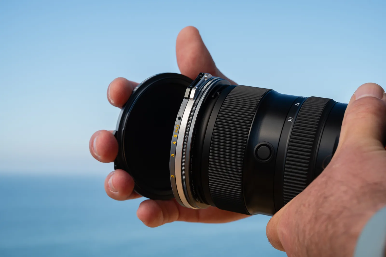 Holding a lens fitted with a 67MAG adaptor ring against the sky