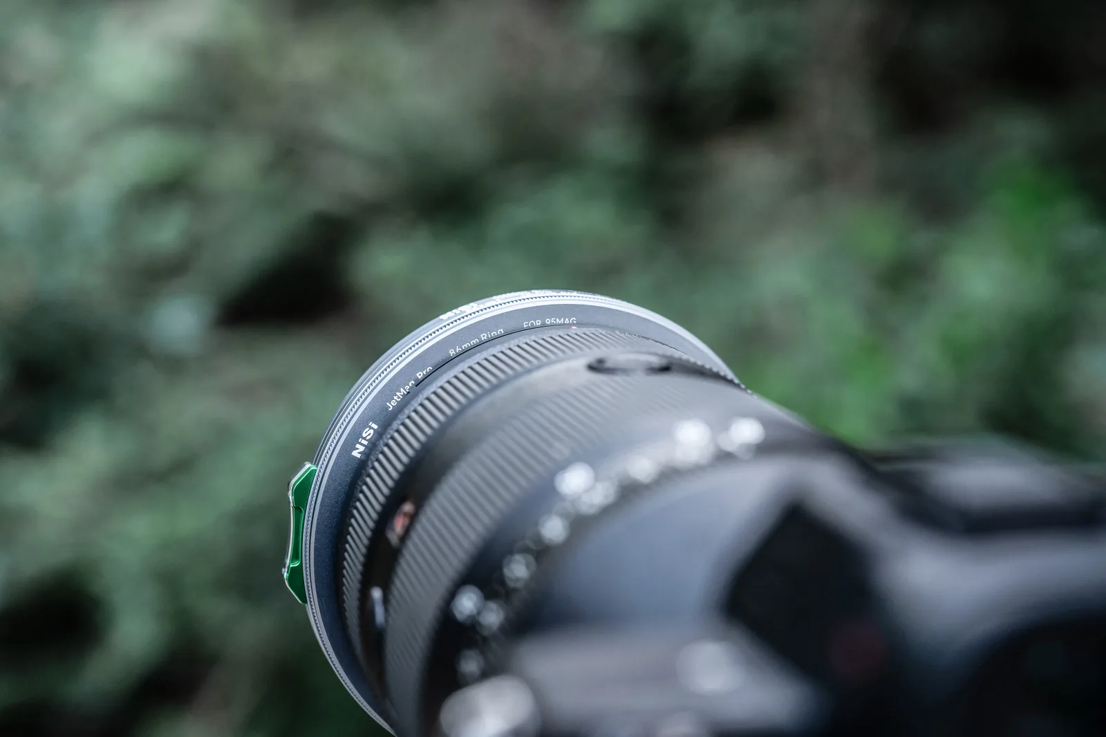 A 95MAG adaptor ring and filter locked on a Sony zoom lens