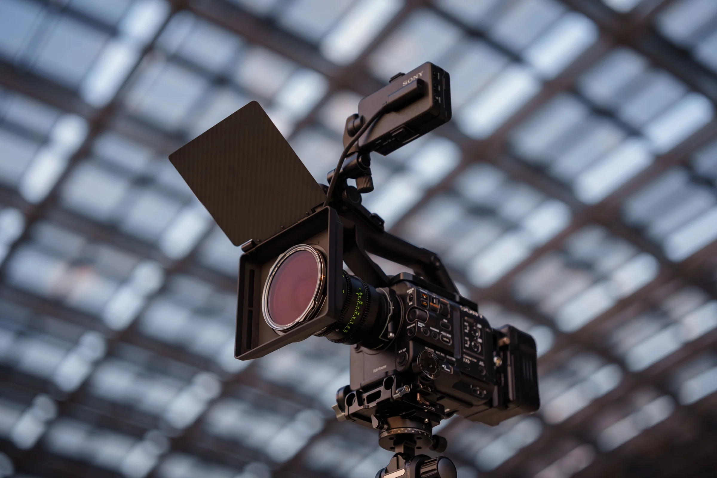 NiSi JetMag Pro Matte Box with carbon fiber top flag and a filter on a cinema camera under a glass roof