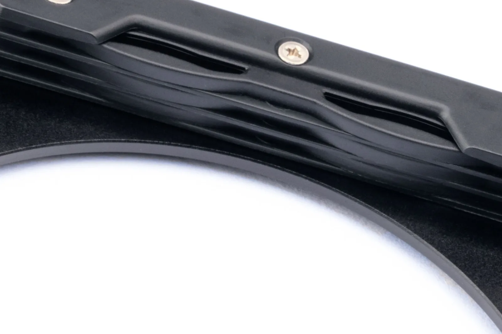 Close-up of the filter clip on the side of a NiSi V7 holder, on a white background